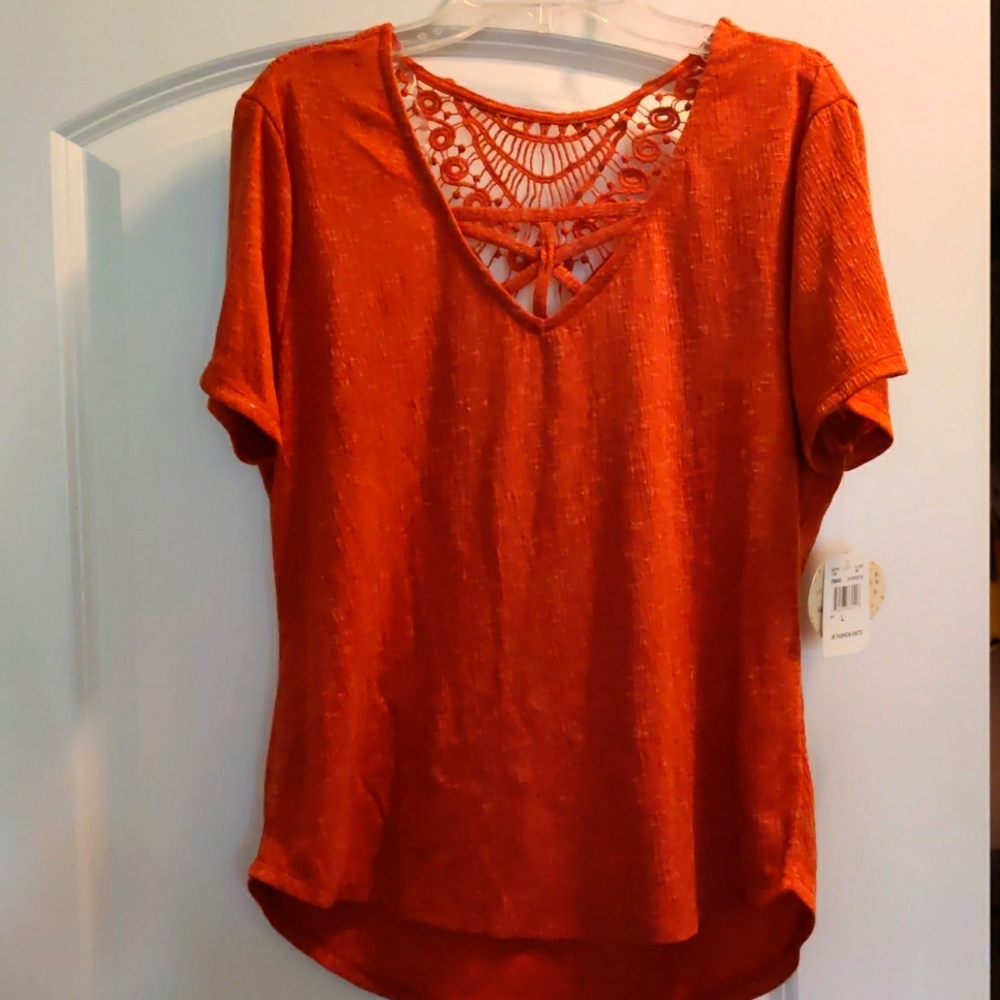 Woman short sleeve top. Sz. L NEW!